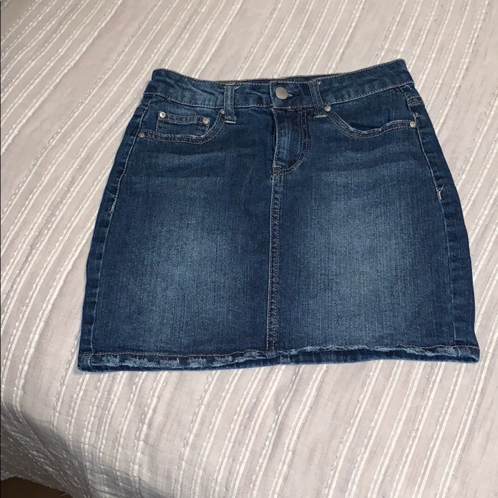 a dark blue jean skirt
